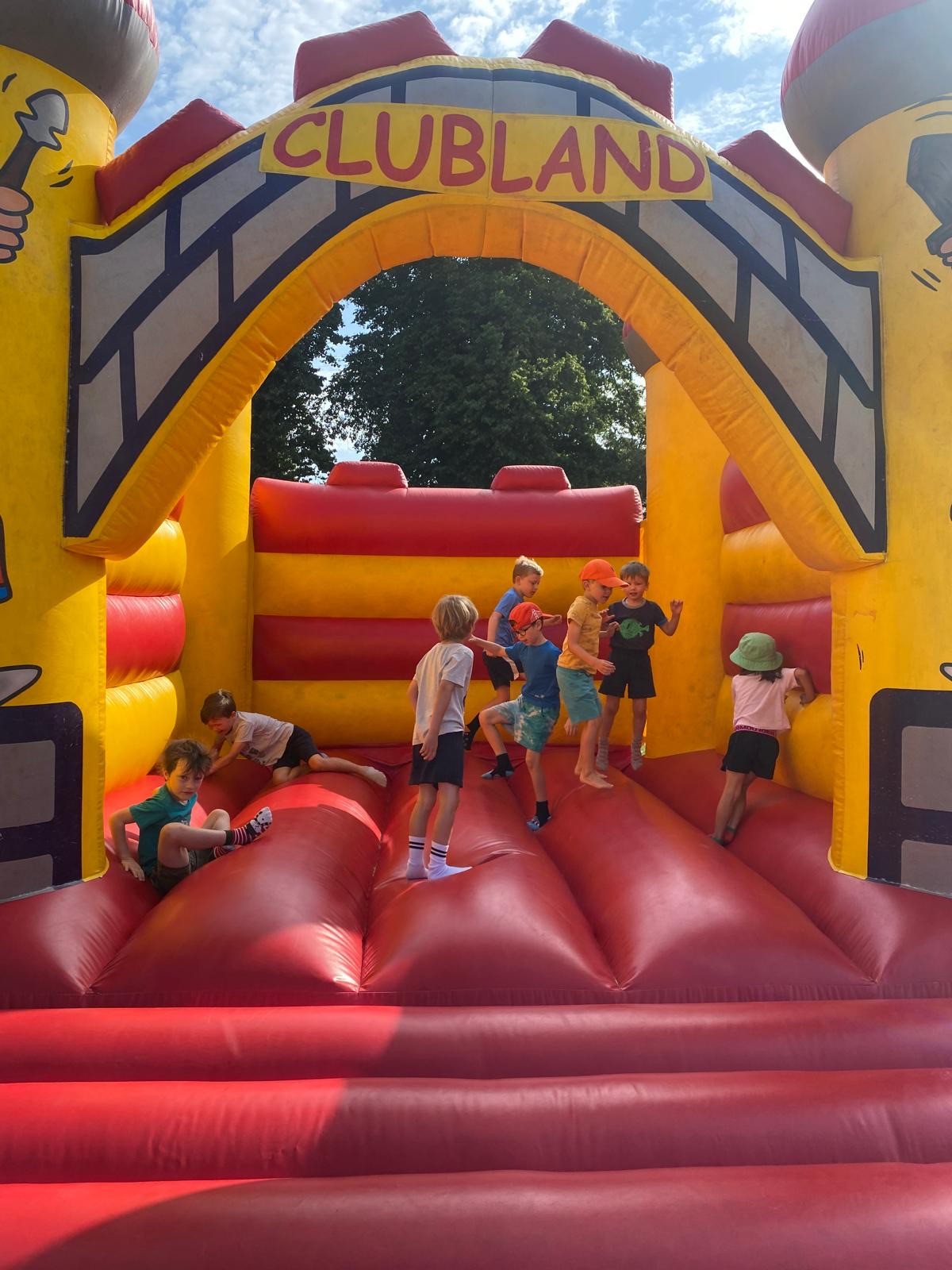 Children playing at Clubland Playscheme holiday club in Surrey