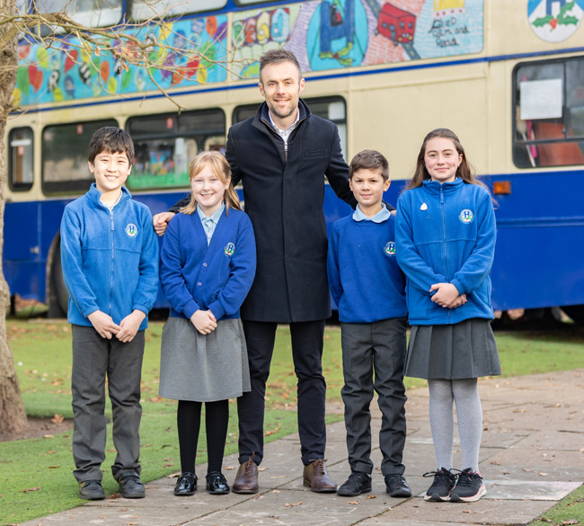 Kids jumping and having fun at The Play Professionals camp
